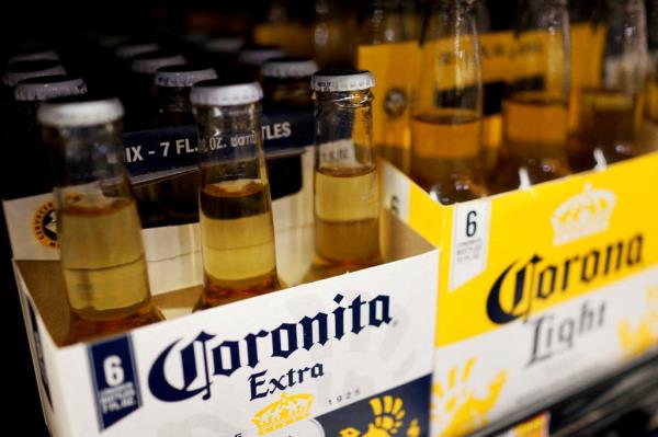 Bottles of Corona beer, a brand of Constellation Brands Inc., displayed on a supermarket shelf in Los Angeles, California.