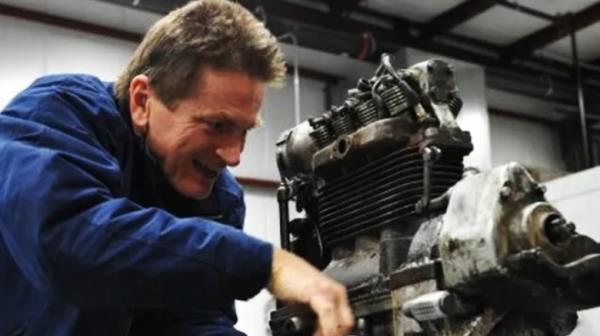 Erik Buell working on engine