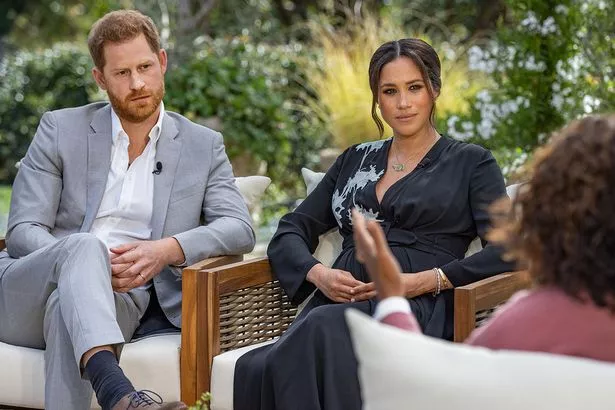 Prince Harry and Meghan Markle 'desperate' to mend royal rift as 'new threat' looms